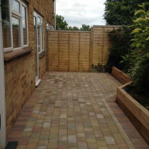 Autumn gold block paved patio area