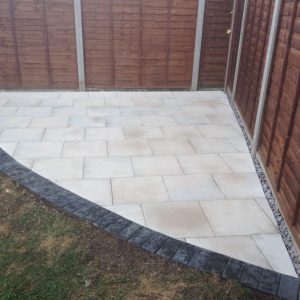 small patio area with charcoal edging